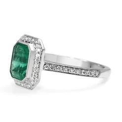 18ct White Gold Emerald and Diamond Halo Ring