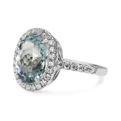 18ct White Gold Oval Aquamarine and Diamond Halo Ring