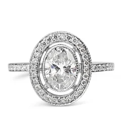 18ct White Gold Oval Diamond Halo Ring