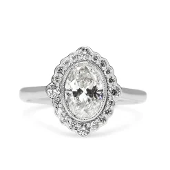 18ct White Gold Oval Diamond Daisy Style Halo Ring
