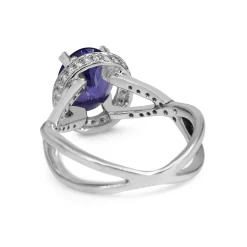 18ct White Gold Tanzanite and Diamond Halo and Twist Ring