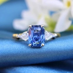 18ct Yellow and White Gold Cornflower Blue Sapphire and Trillion Diamond 3 Stone Ring