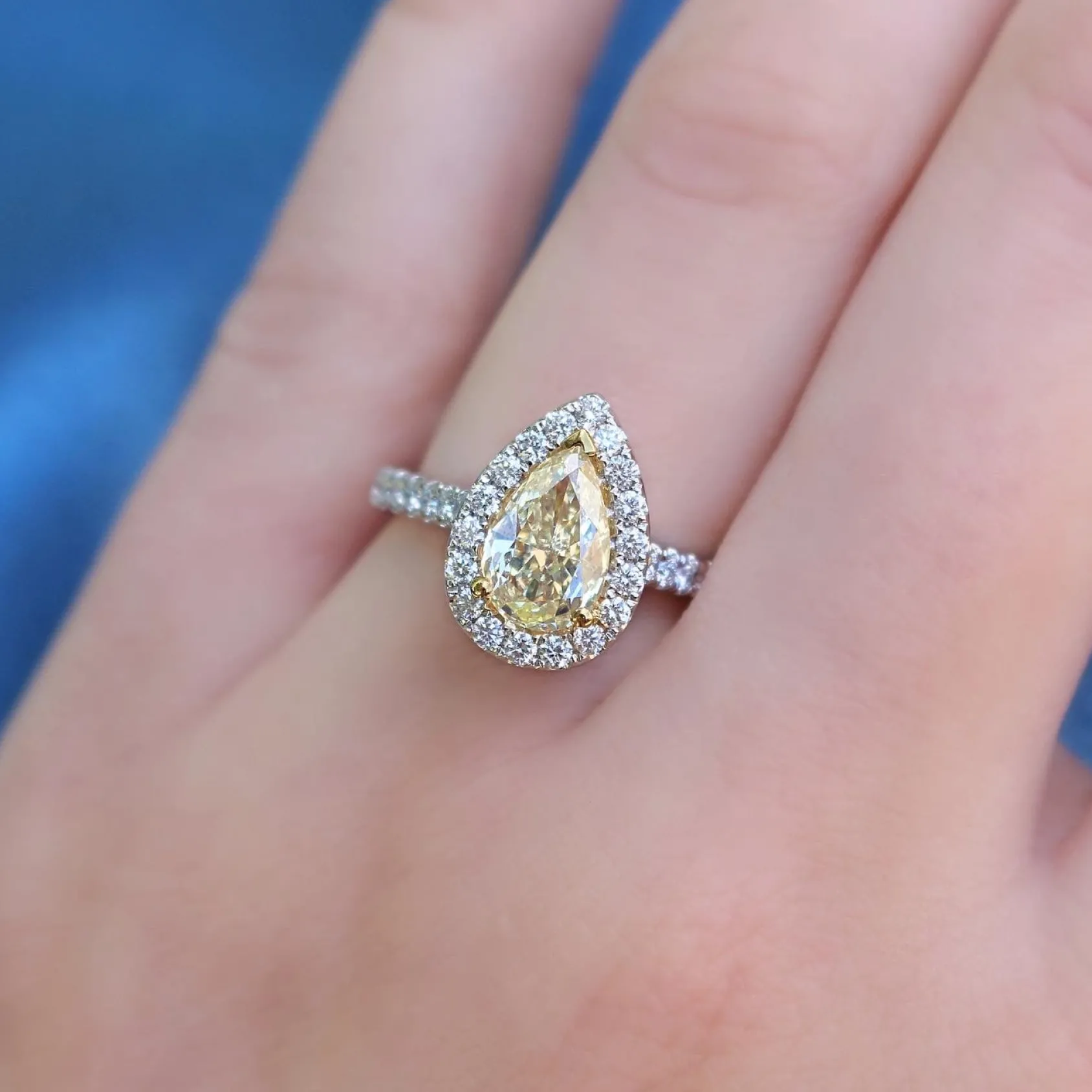 18ct Yellow and White Gold Fancy Yellow Pear Diamond Halo Ring