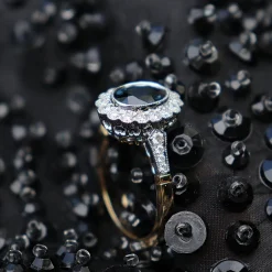18ct Yellow and White Gold Oval Sapphire and Diamond Daisy Style Ring