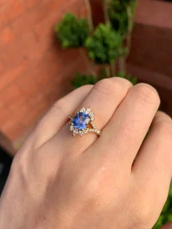 18ct Yellow Gold Radiant Cut Sapphire and Pear Diamond Ring with Split Shank