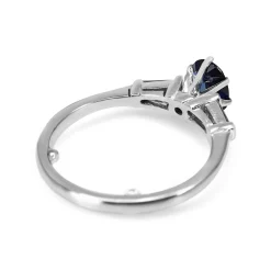 Platinum Oval Sapphire and Baguette Diamond 3 Stone Ring