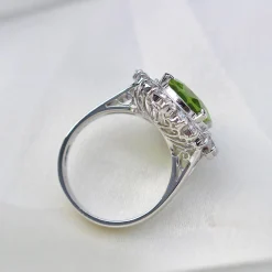 Platinum Peridot and Diamond Cluster Ring